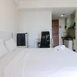 Homey And Cozy Studio Apartment At Dago Suites By Travelio
